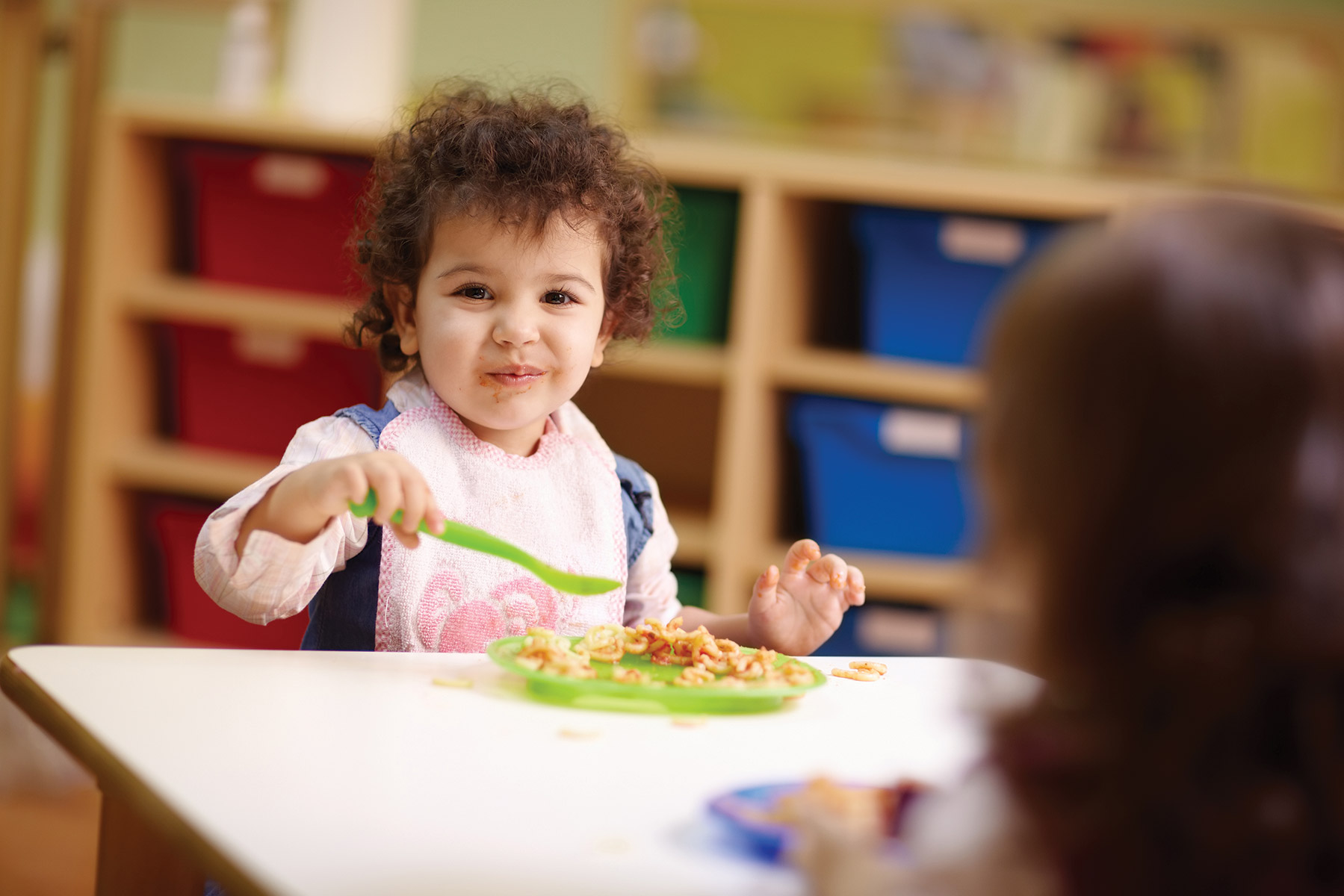 toddler eating at preschool