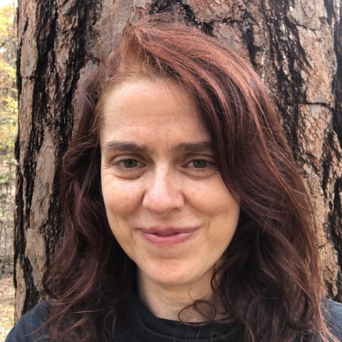 Headshot of Allison in front of a tree