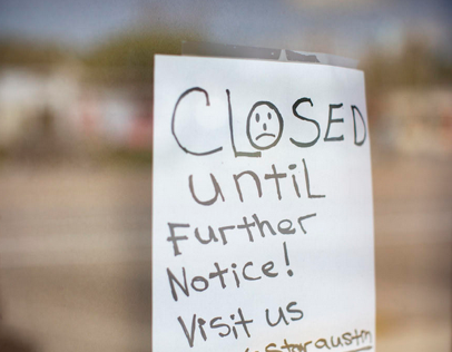 "Closed until further notice" written on a sign