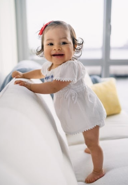 A smiling toddler girl